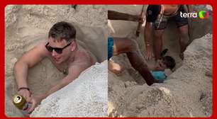 Turista britânico cava buraco, fica preso por 3 horas e precisa ser resgatado na Praia de Copacabana